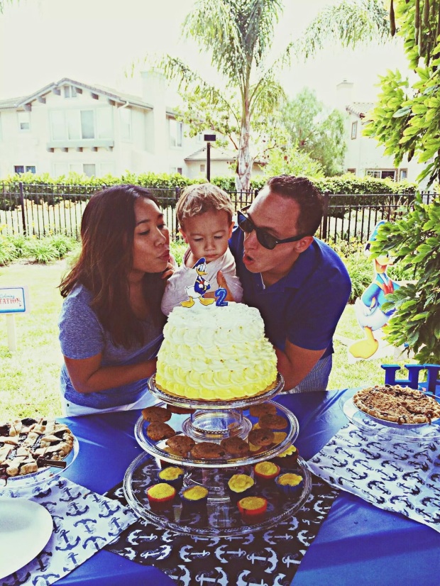Blowing out candles // Donald Duck Nautical birthday cake